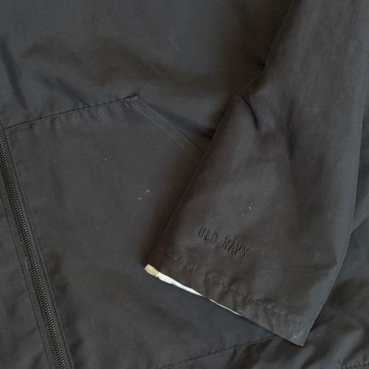 Black cropped windbreaker jacket