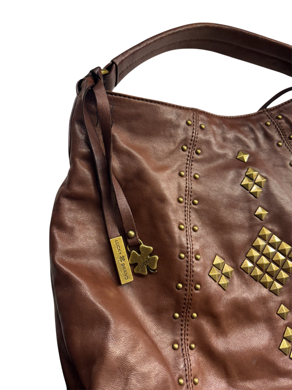 Brown hobo style studded leather bag