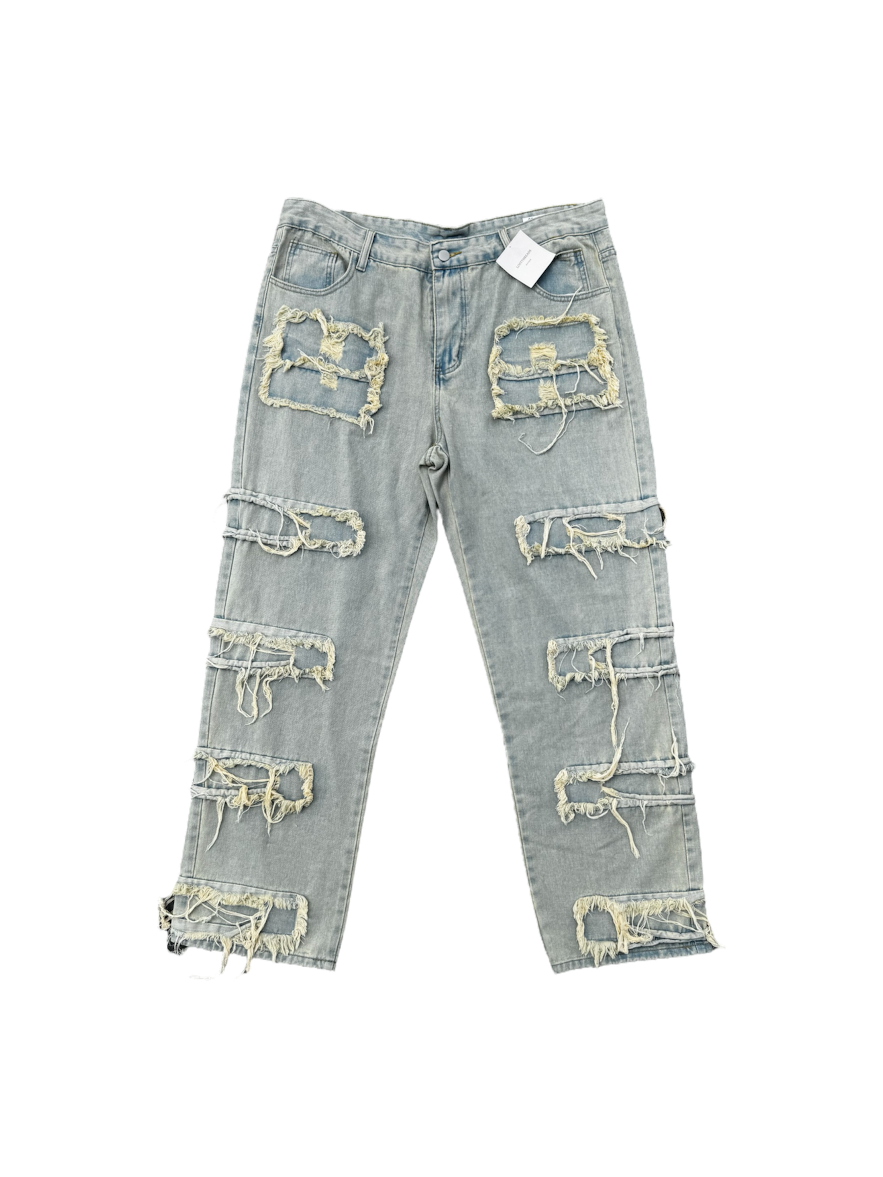 Cream / light wash distressed denim jeans