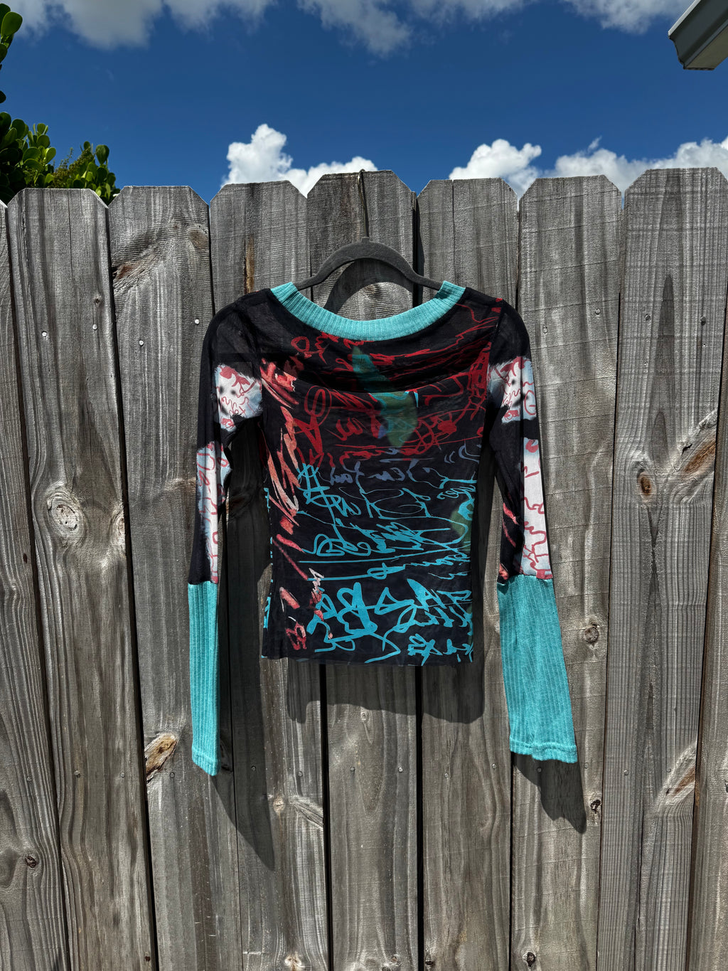 Script pattern mesh long sleeve top