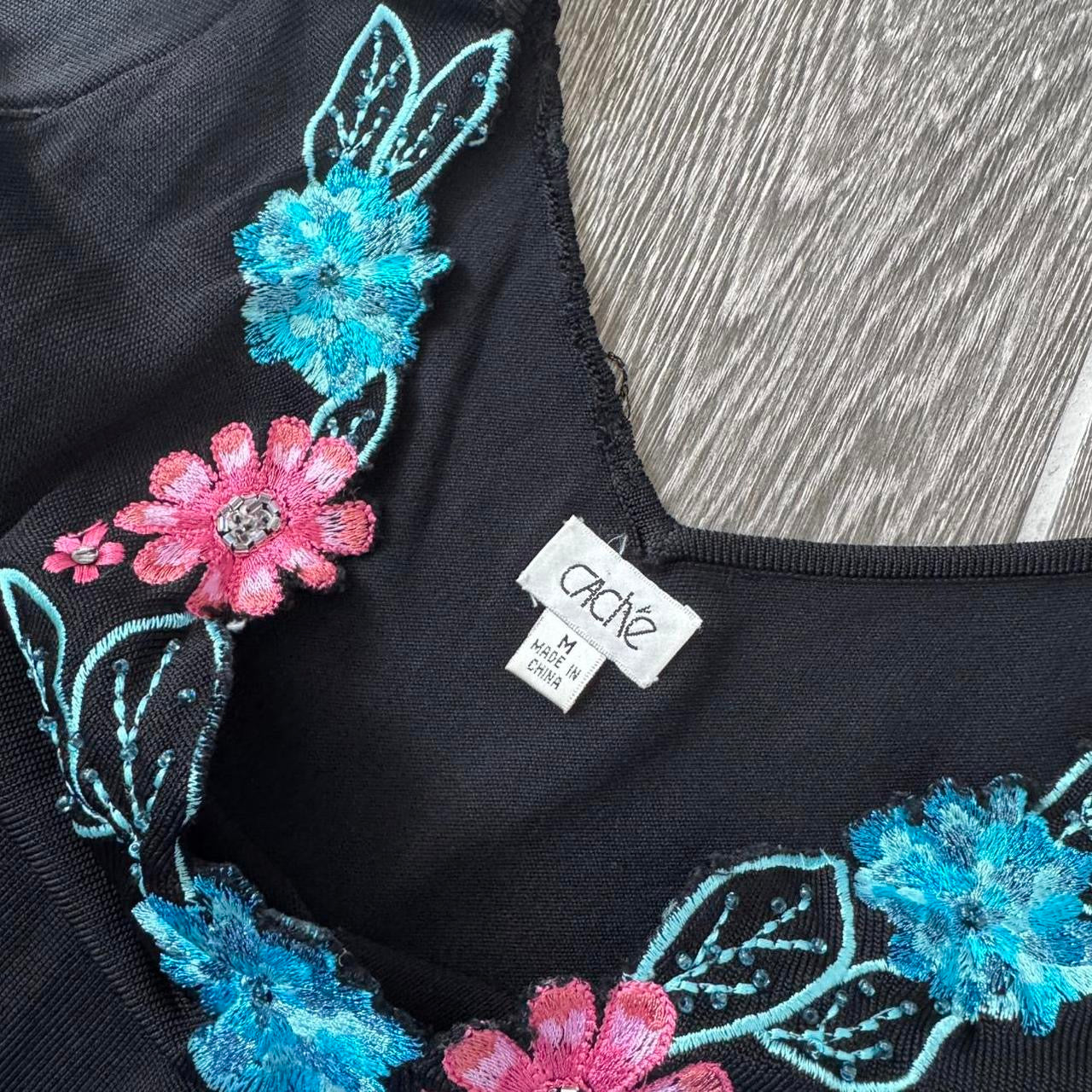 Black embroidered floral beaded neckline trim detail knit top