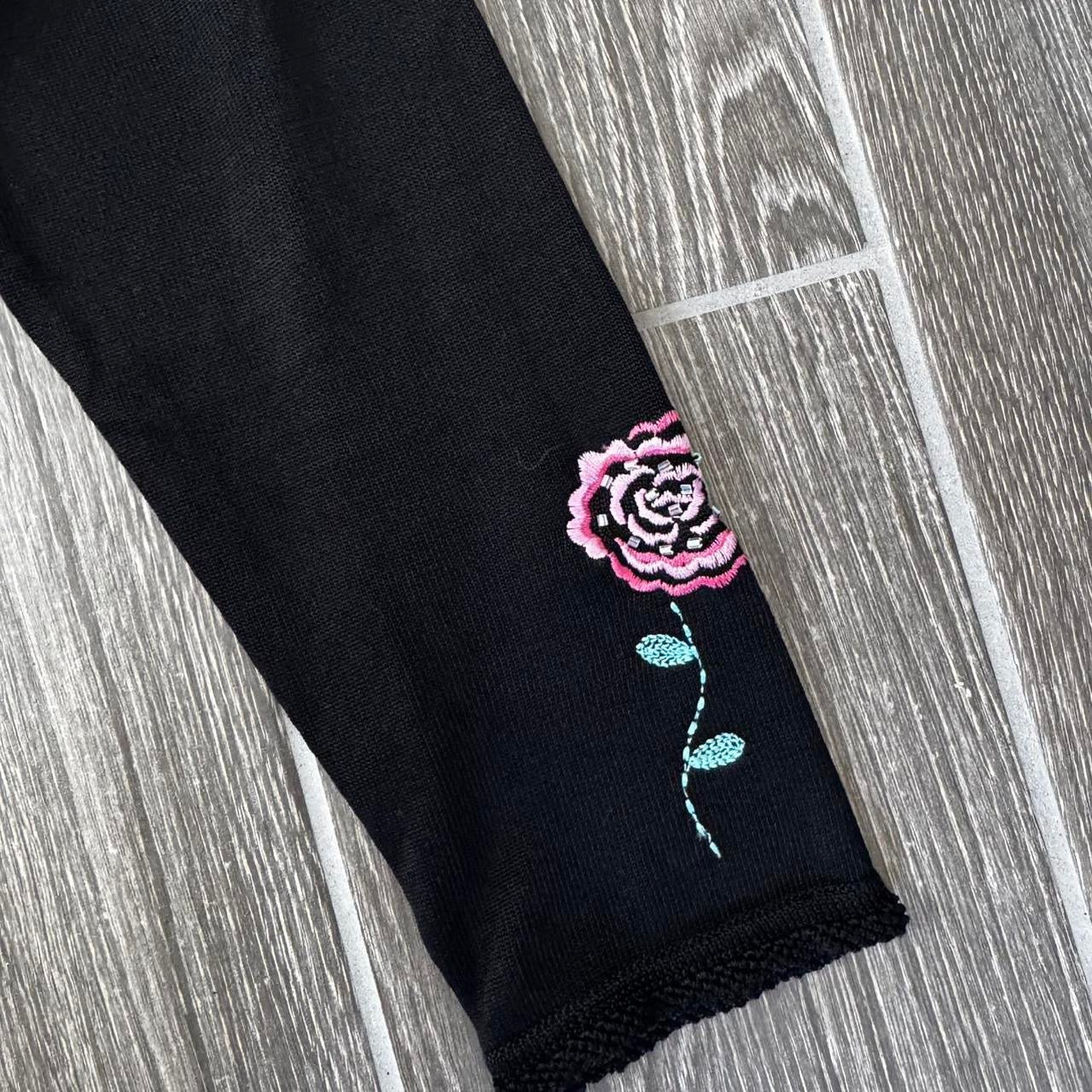 Black embroidered floral beaded neckline trim detail knit top