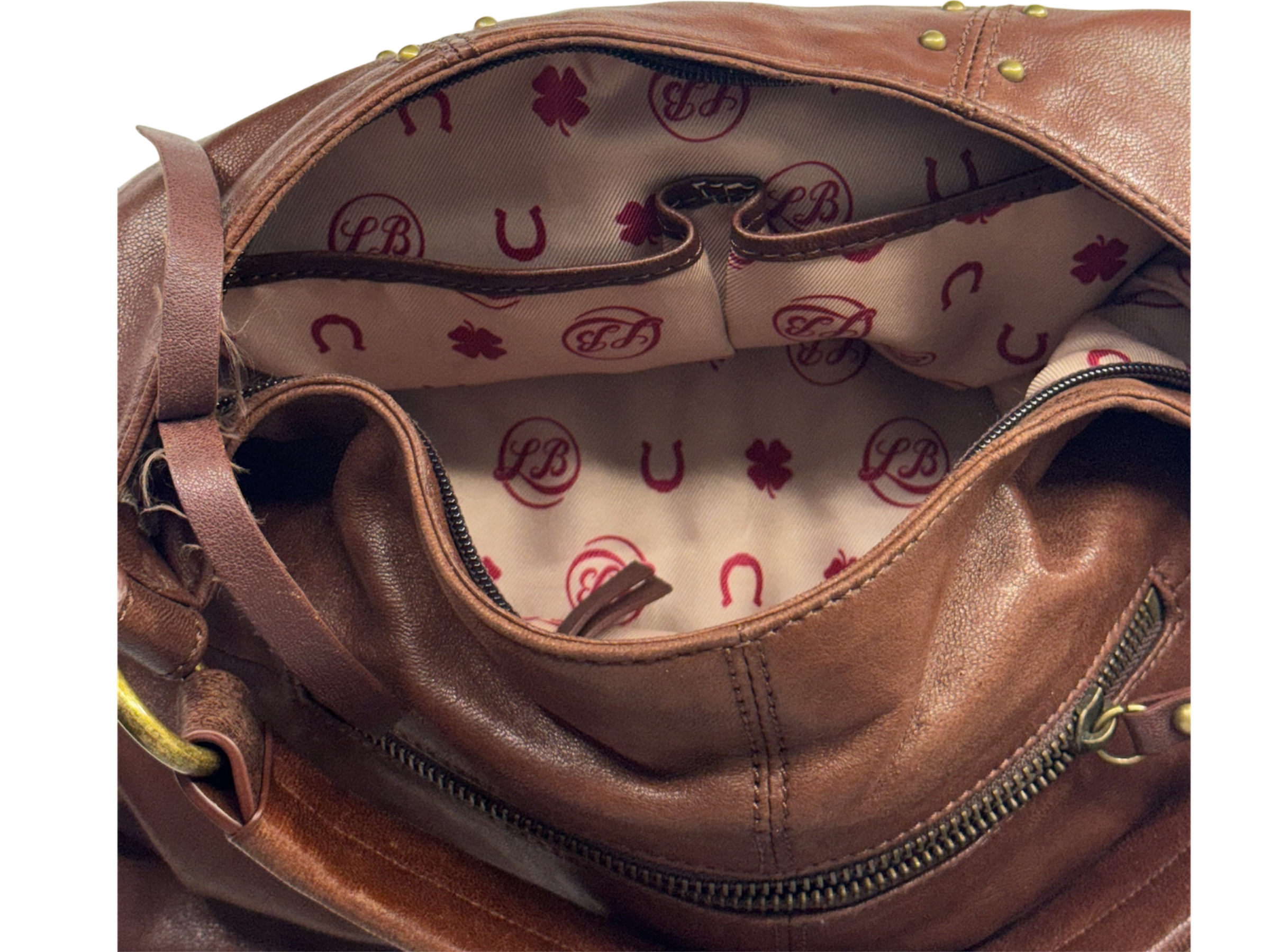 Brown hobo style studded leather bag