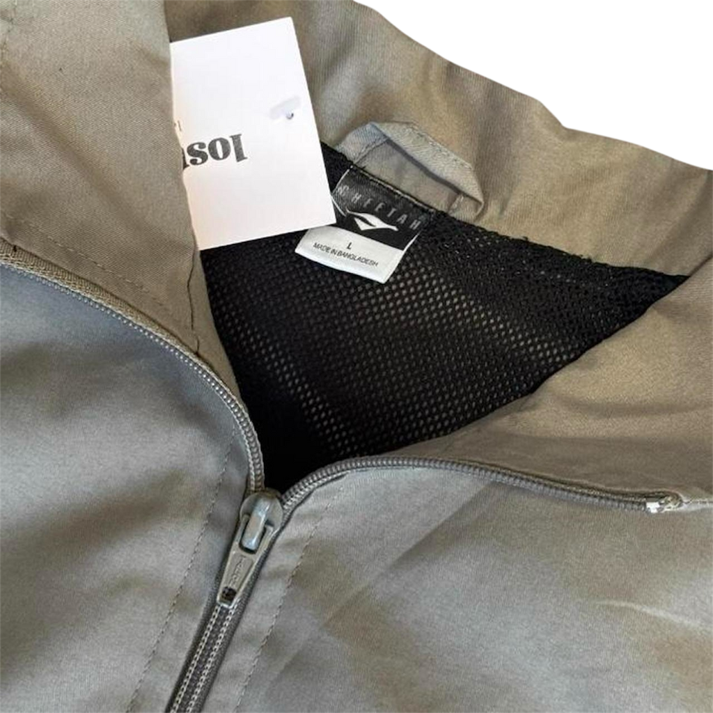 Beige and black windbreaker jacket