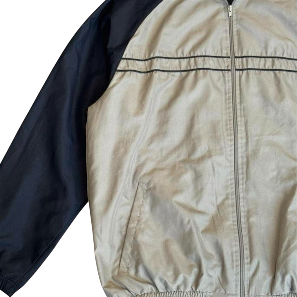 Beige and black windbreaker jacket